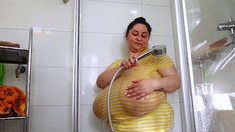 Busty curly brunette with big boobs fucks on couch