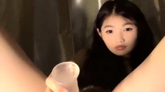 Sexy asian toys her pussy and ass on webcam