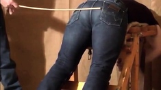 Caned over tight jeans Daddy boy